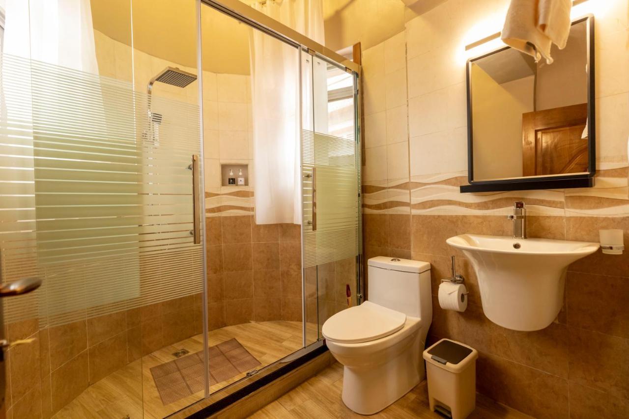 Inganzo Boutique Hotel Kigali Bagian luar foto