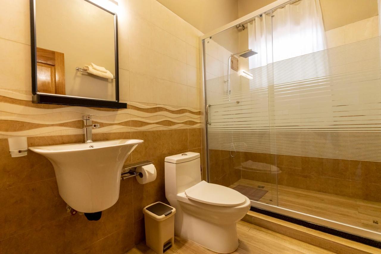 Inganzo Boutique Hotel Kigali Bagian luar foto